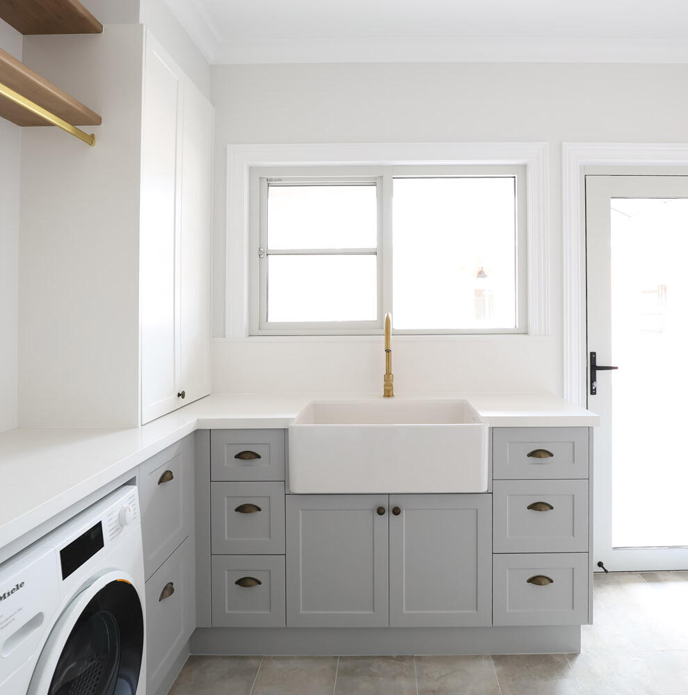 Modern white and grey laundry renovation in Bendigo home